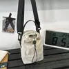 La popular bolsa para botella de agua de color sólido de este año es adecuada tanto para hombres como para mujeres, ideal para el ocio al aire libre, ultraligera, resistente al agua, bolsa pequeña portátil, funda versátil para teléfono
