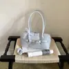 Bolso de mano de gran capacidad estilo coreano, nuevo 2026 vintage simple color liso casual elegante de un solo hombro bajo el brazo para mujer
