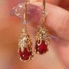 Pendientes vintage Pixiu de cobre con microincrustaciones de circonita, nuevos pendientes rojos elegantes y atmosféricos de alta gama.