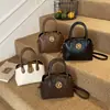 Bolsa Pequena Retrô Francesa para Mulheres Outono e Inverno 2026 Nova Moda Bolsa de Ombro Nicho Bolsa Transversal para o Dia a Dia