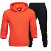 Conjunto de sudadera de color liso de talla grande para hombre y mujer, 220 g de tela, fabricante mayorista, conjunto holgado de talla grande de marca de moda para parejas