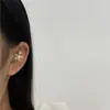 Agulha de Orelha Perfurante Transfronteiriça Nova Gancho de Orelha Personalizado Caractere Único Clipe de Osso de Orelha Envolvente Contorno Galvanizado Ouro Real Feminino