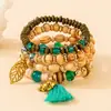 Produto mais vendido: Pulseira com Pingente de Elefante e Franja Folha Oca Estilo Boêmio, Pulseira de Contas de Madeira Multicamadas