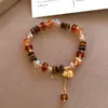 Pulsera Geométrica de Zirconia y Ojo de Tigre Estilo Retro Maillard con Cuentas Pulsera de Lujo Ligero de Gama Alta Joyería de Mano Personalizada de Moda