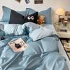 Juego de dormitorio de cuatro piezas estilo princesa de color sólido fresco de algodón lavado amigable con la piel cepillado funda de edredón funda de almohada funda de edredón pieza individual