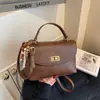 Bolso Versátil de Moda para Mujer 2025 Otoño Nuevo Tendencia Callejera Bolso de Mano para el Trabajo y el Viaje Bolso Cruzado Pequeño Cuadrado para Mujer