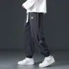 Calças casuais de veludo cotelê para outono para homens, novas calças jogger de retalhos de chenille com corte solto, calças de moletom esportivas de marca da moda