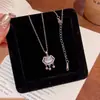 Collar Colgante Candado de Paz Piedra Ojo de Gato 2026 Modelo Nuevo Cadena de Clavícula de Gama Alta Estilo de Nicho de Lujo Ligero Cadena de Cuello Versátil