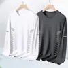 Camiseta casual masculina versátil de cor sólida para o outono 2026, gola redonda solta, manga longa, top moderno