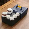 Juego de té de viaje traje pequeño cerámica exterior hogar Kung Fu una tetera cuatro tazas tetera taza portátil regalo creativo