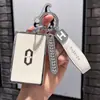 Aplicable al mundo M5 juego de llaves tarjeta AITO Jin Kang Celis Huawei estuche para llave de coche mundial hebilla de metal