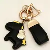 Consigue inmediatamente llavero colgante de dinero personalidad creativa colgante de cuero exquisito para hombres y mujeres pareja bolsa llavero de coche
