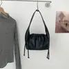 Nova bolsa de couro macio com cordão estilo coreano para mulheres, bolsa de ombro/axila de nicho de alta qualidade para o dia a dia