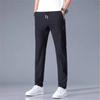Pantalones deportivos de seda de hielo de verano para hombre, pantalones casuales bordados, sueltos, modernos, para jóvenes, pantalones holgados de pierna recta de talla grande.