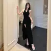 Vestido de verano 2025 nuevo estilo francés de alta gama, elegante, con cuello en V, sexy, con abertura en la cadera, largo y moderno.