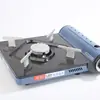 Estufa de cassette azul ultradelgada para tours en autocaravana, con superficie de quemador engrosada, adecuada para cocinar al aire libre, hacer fideos y picnics; portátil y compatible con cartuchos de gas