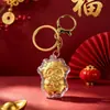Flor de dinero de hoja de oro estilo Shuibei, oveja pequeña, cadena para teléfono, llavero colgante, regalos culturales y creativos para el Año Nuevo Chino al por mayor