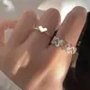 Anillo de amor hueco para mujer, anillo abierto, diseño de nicho, estilo moderno y frío, anillo de moda personalizado para el dedo índice de mujer.