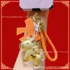 Llavero Dorado con Oro Puro, Simbolizando Riqueza Instantánea, Colgante para Teléfono, Colgante para Bolso con Certificado, Venta al por Mayor de Accesorios