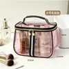 Bolsa de maquillaje de PVC, impermeable, transparente, bolsa de almacenamiento de gran capacidad, bolsa de aseo portátil, venta directa desde fábrica transfronteriza