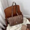 Diseño retro de nicho, bolso tipo baguette para debajo del brazo, gran capacidad, bolso de hombro para el día a día, nuevo modelo 2026, bolso tote simple y elegante