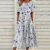 2026 Venda Quente Transfronteiriça Amazon Vestido Casual de Verão Feminino com Gola Redonda, Estampa Floral, Estilo Elegante e Bolsos