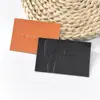 Etiquetas de cuero hechas a medida con textura especial, etiquetas de cuero con efecto metálico y accesorios de marca hechos a medida para jeans y ropa