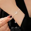 Pulsera de Concha con Mariposa Incrustada de Circonita, Lujo Ligero y Sensación de Alta Gama, Joyería Elegante y Fresca de Estilo Dulce al por Mayor