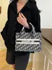 Bolsa de grande capacidade feminina 2025, nova moda transfronteiriça, letras bordadas, bolsa portátil, bolsa de um ombro, bolsa axilar