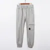 Pantalones de lente europeos y americanos transfronterizos CP multibolsillo de ocio y deportivos funcionales cortavientos para hombre y mujer CP de pierna estrecha venta al por mayor