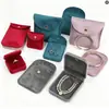 Bestseller transfronterizo: Bolsita de joyería con botón de presión de esquinas redondeadas, bolsa de terciopelo para anillos, pulseras y joyas, se puede personalizar con logo
