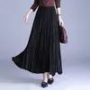 Tejido premium de una sola capa, falda plisada texturizada popular para mujer, colección de otoño 2026, falda larga de cintura alta con dobladillo grande, falda midi simple
