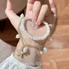 Pulsera con colgante de estrella de mar y concha estilo vacación playera europea y americana para mujer, joyería de perlas sintéticas de múltiples capas apiladas a la moda