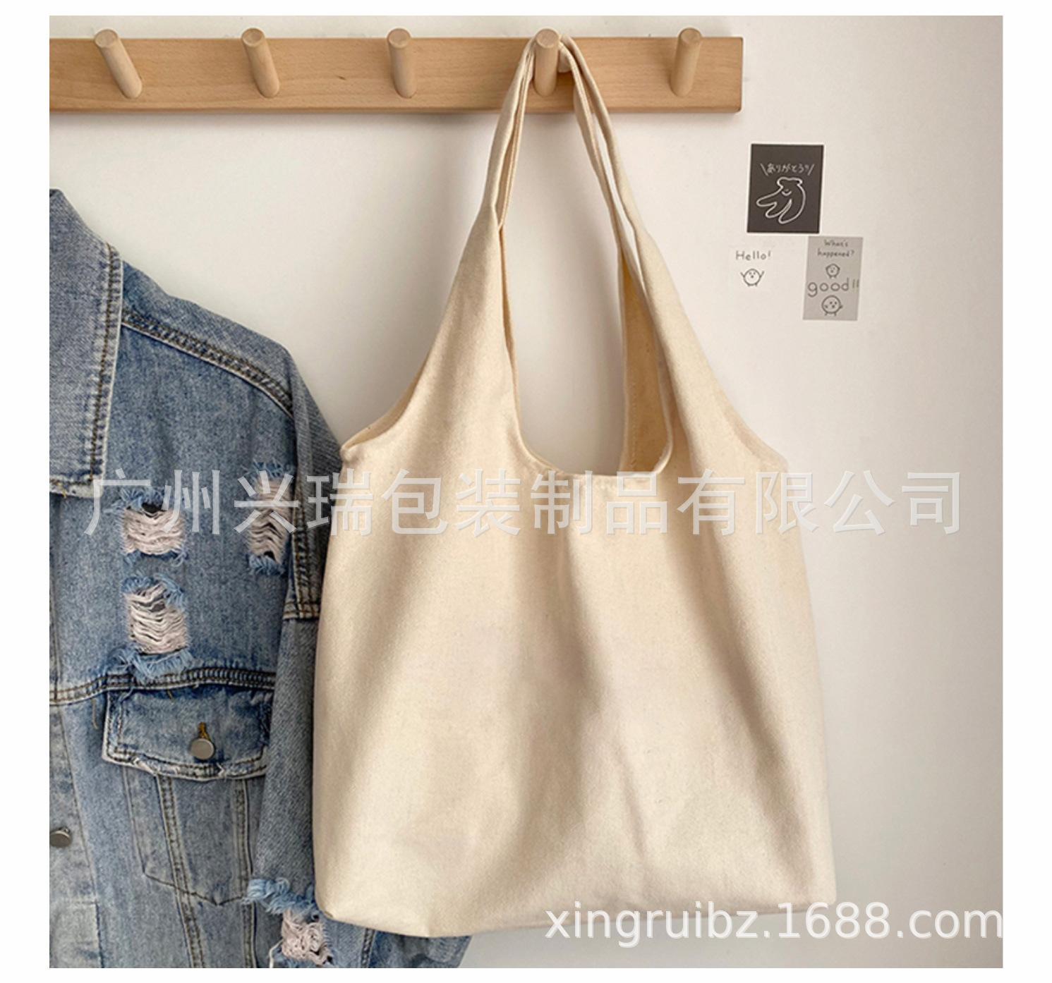 新款上课大学生小众单肩帆布包_08.jpg