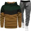 Conjunto de Moletom Esportivo Outono/Inverno Europeu e Americano Transfronteiriço Masculino com Capuz 3 Cores Conjunto de Roupa Esportiva Moletom e Calça de Moletom Light Board