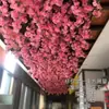 Ramas de flor de cerezo flor de durazno falsa plantas verdes de techo decoración enredaderas de flores de interior pared de celebridad de internet supermercado restaurante habitación cubierta superior fealdad