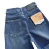 Emagrecimento visual~~Estica em quatro direções, naturalmente retrô, desgastado, design com fenda na linha do meio, jeans de perna reta estreita para mulheres, outono