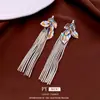 Pendientes Vintage de Aguja Plateada con Borlas y Hojas Tachonadas de Diamantes, Estilo de Mediados de Siglo, Pendientes de Botón Versátiles de Moda de Lujo Ligero con un Diseño Único