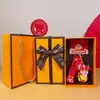 2025 Año de la Serpiente Tendencia Nacional Creativo Pequeña Serpiente de la Suerte Llavero Caja de Regalo Lindo Bolso Llavero Colgante Venta al por Mayor Pequeños Regalos
