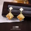 Brincos de tarraxa de cristal com cores degradê fresh de agulha de prata, brincos geométricos de losango com temperamento de nicho, brincos de luxo leve e com sensação de alta qualidade para mulheres