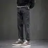 Pantalones casuales de rebaja para hombre rectos holgados marca de moda overol tipo harén otoño e invierno Nueva Moda pantalones largos deportivos