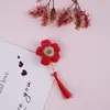 Material hecho a mano tejido flor borla accesorios para cabello largo aretes pinza para el cabello accesorios al por mayor flor de lana DIY