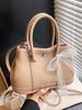 Corea del Sur Moda Estilo Casual Simple Bolso de Cubo Portátil para Mujer Elegante Estilo de Alta Gama Práctico Combinable Color Sólido Bolso Cruzado