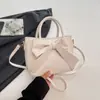 Bolsa Feminina Transfronteiriça Moda Gentil Simples Bolsa de Mão com Laço 2026 Nova Cor Sólida Estilo Coreano Bolsa de Ombro Único Transversal Feminina