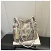 Bolso de hombro estilo nuevo Verano 2026, bolso de tela bordada elegante y de alta gama, moderno y versátil, bolso tote de axila de nicho y elegante