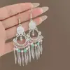 Aretes de Estilo Exótico de Venta Caliente Retro Literario Clásico Dignificado Ganchos para la Oreja Versátil Hueco Moda Borla Colgantes