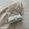 Bolso Retro de Lunares Francés para Mujer 2026 Nuevo Bolso Baguette Brillante de Nicho Versátil Bolso de Hombro