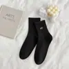 Outono e inverno novo cor sólida pequeno bordado de amor meias de cano básicas estilo acadêmico meias infantis versáteis estilo acadêmico meias femininas