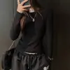 Camiseta básica de manga larga para mujer, hombro recto, cuello redondo, color liso, versátil, adecuada para usar en capas o sola, otoño 2026