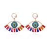 Pendientes de aleación con diseño exagerado europeo y americano con forma de ojo de diablo y diamantes, con personalidad y gran sentido de perla para mujer.